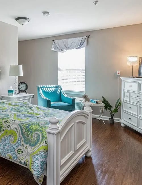 Brightly decorated bedroom in a senior living facility