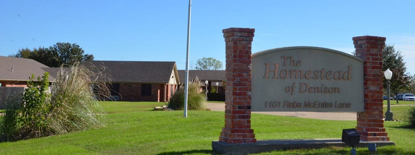 Exterior view of The Homestead of Denison facility sign