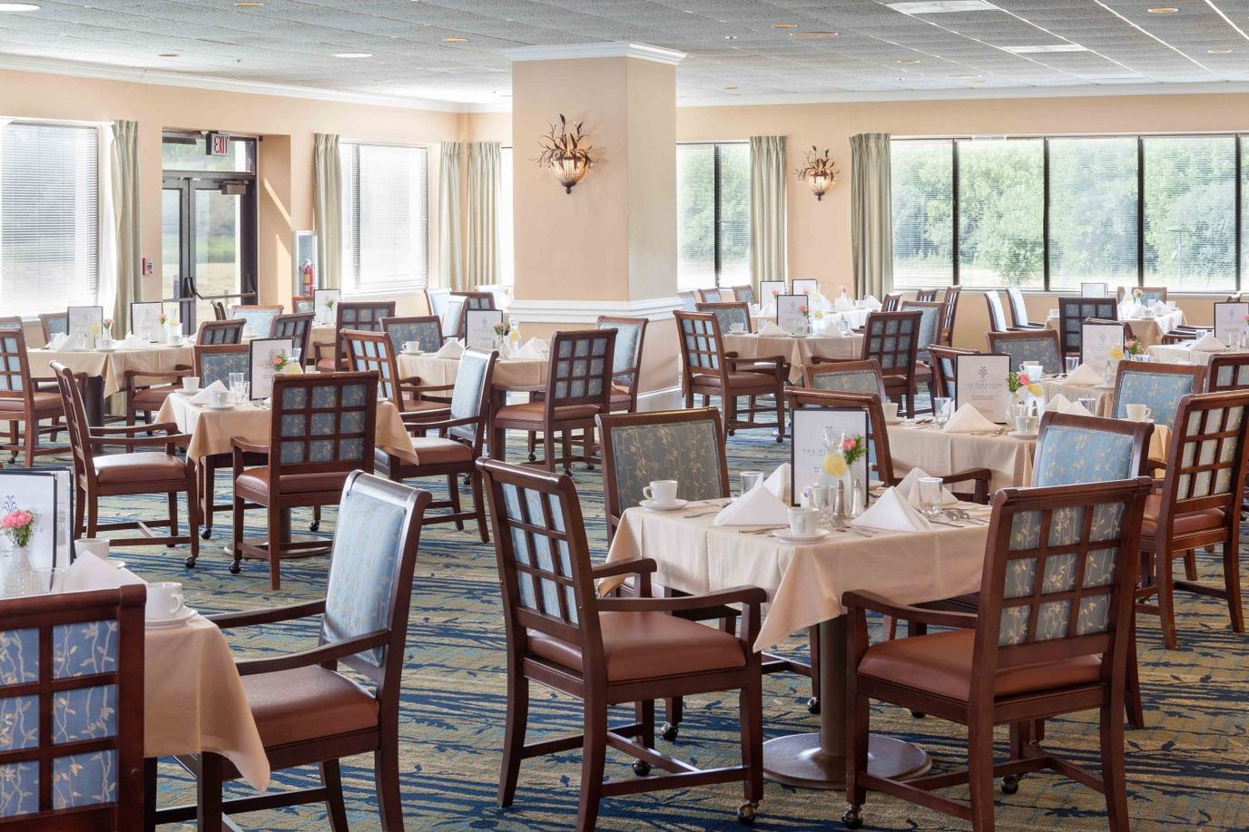 Dining area with tables set for meals
