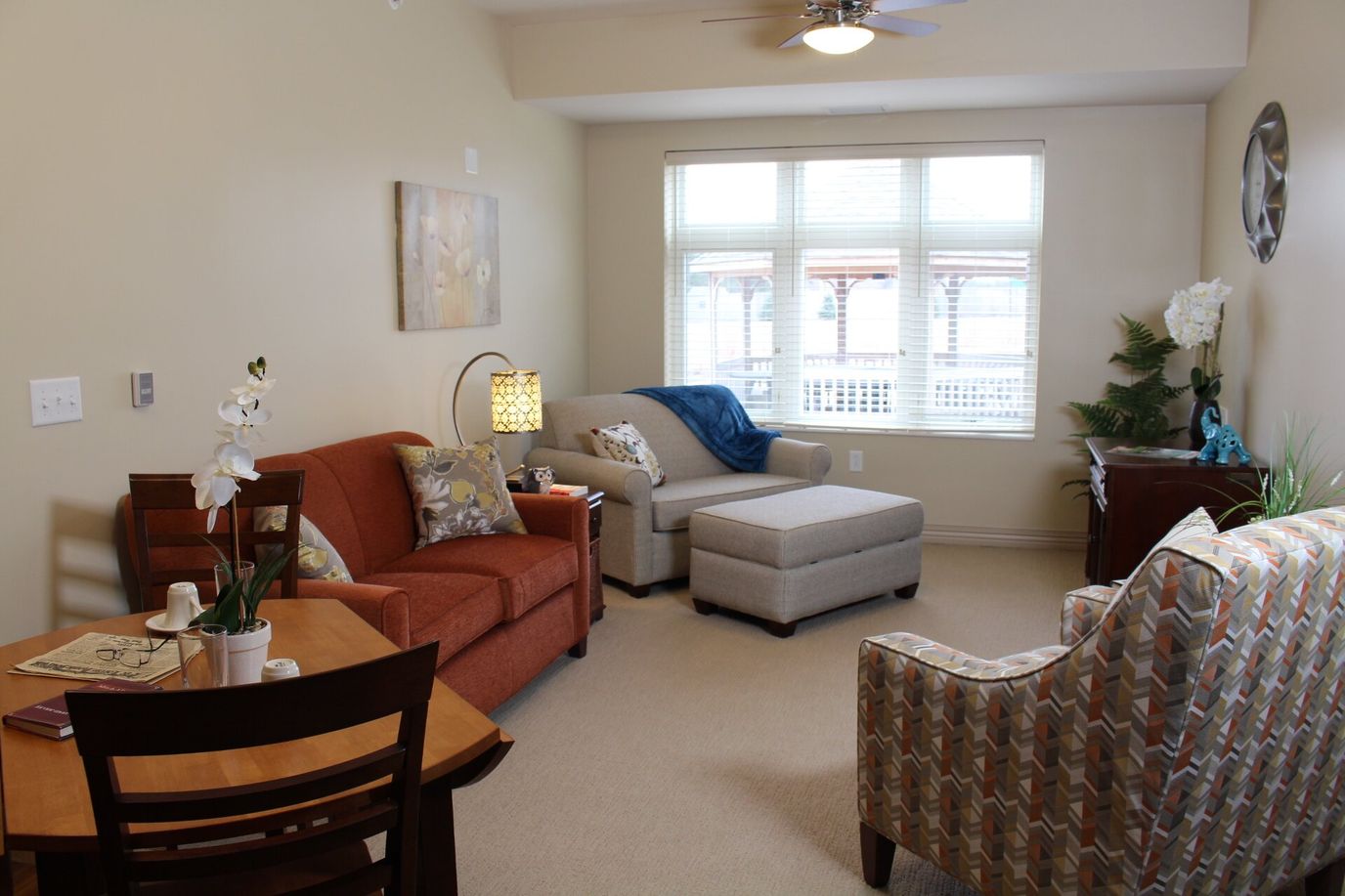 Well-furnished common area with natural light