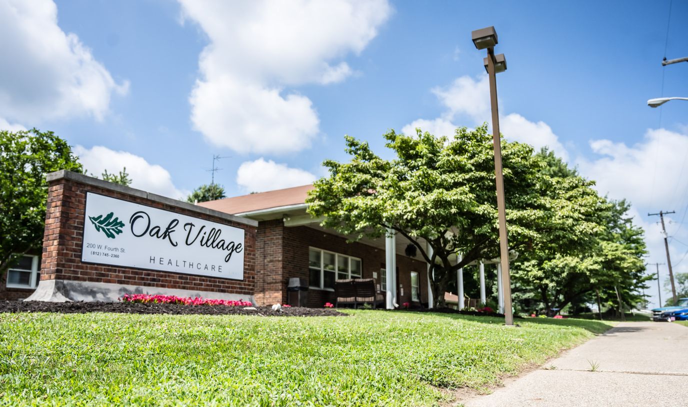 Exterior view of Oak Village healthcare facility