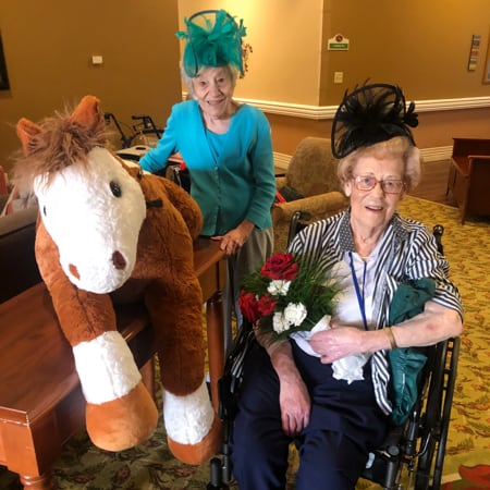 Residents dressed up with props for an event