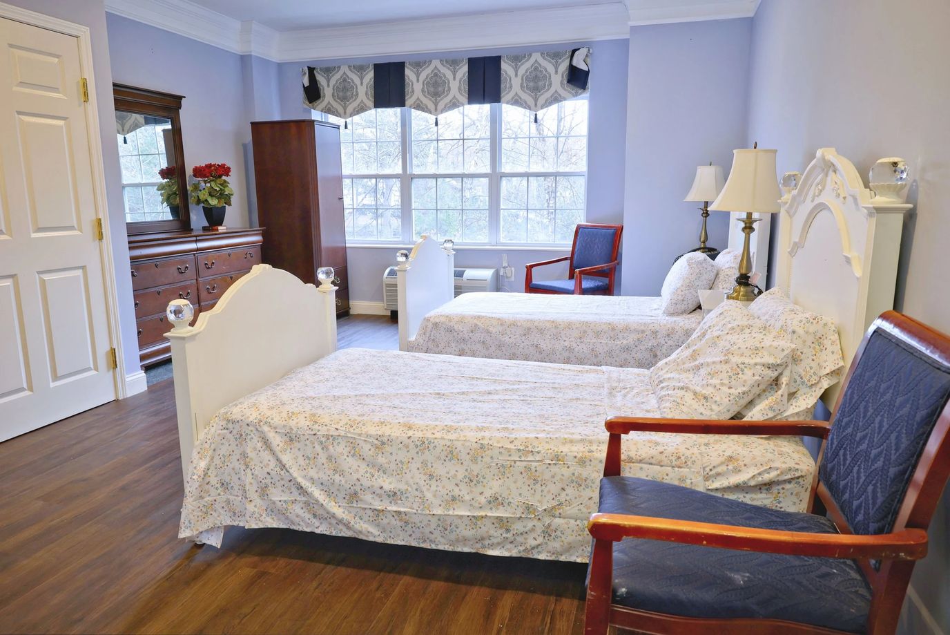 Interior view of a shared resident room with two beds