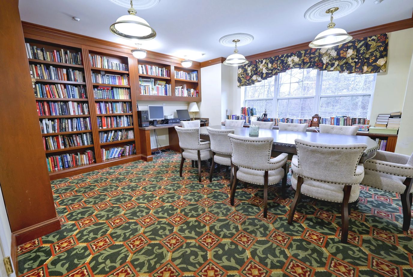 Cozy library with bookshelves and seating
