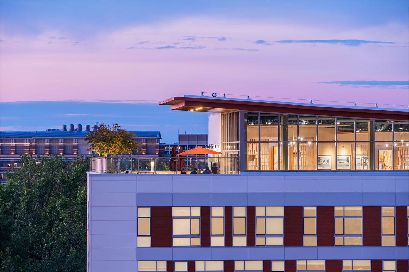Exterior view of the facility with a rooftop space