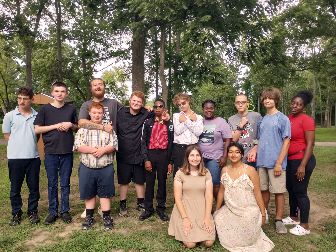Group of residents and staff enjoying the outdoors