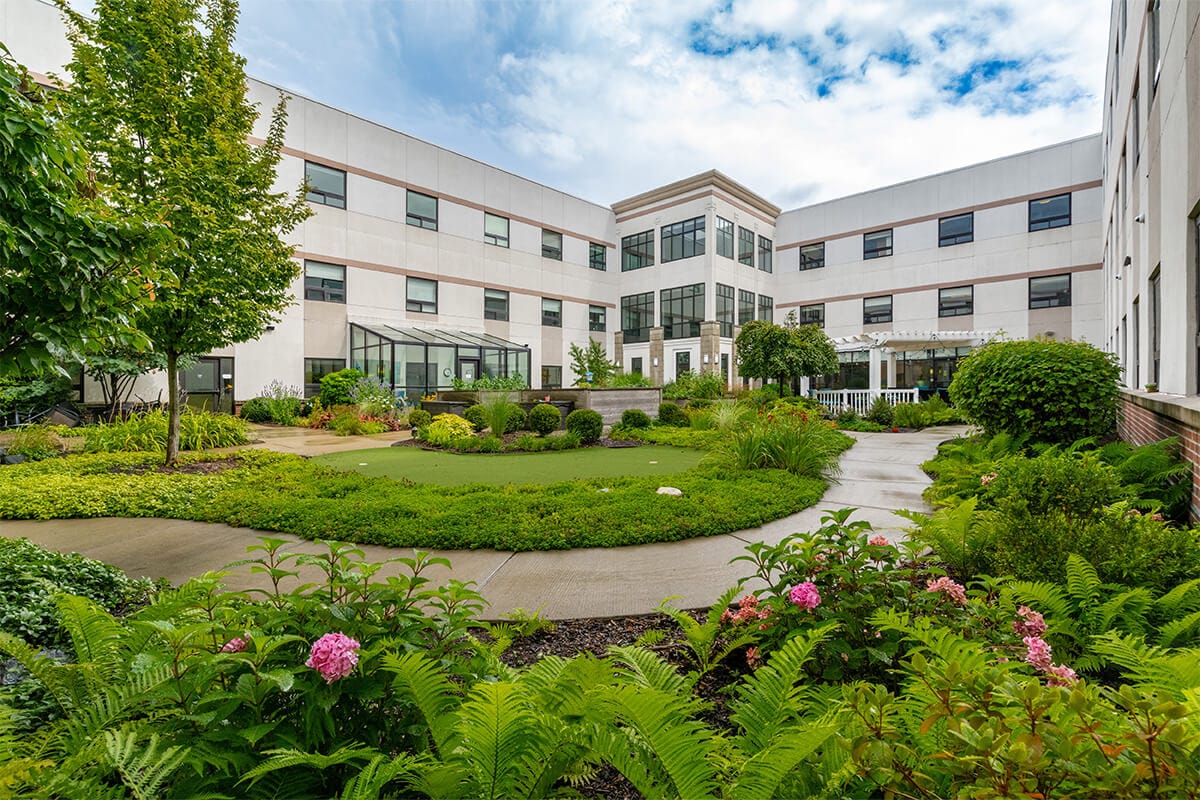Beautiful landscaped courtyard with greenery and flowers