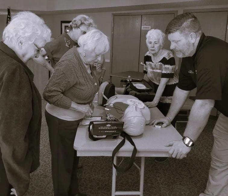 Residents participating in a CPR training session
