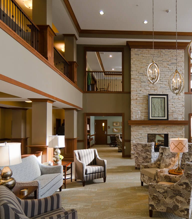Interior common area with seating and fireplace