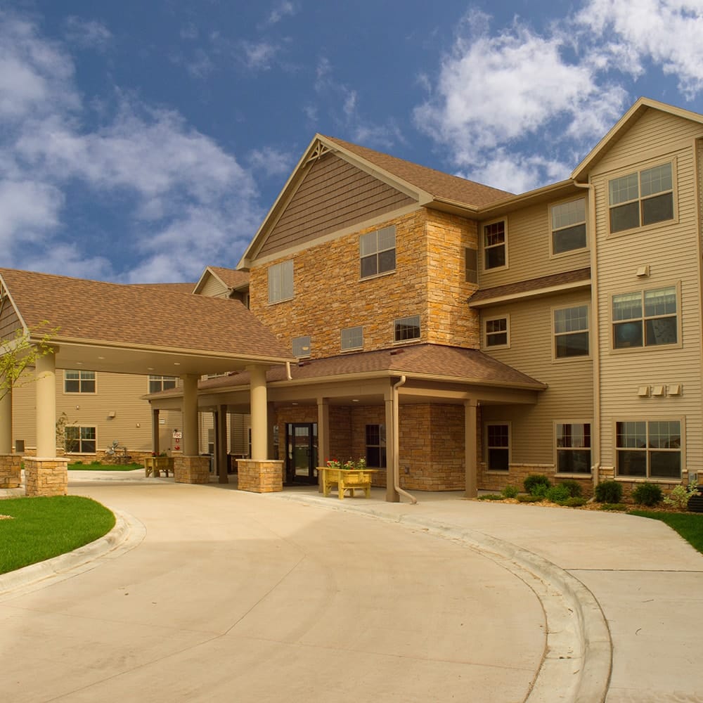 Exterior view of All Saints Senior Living facility