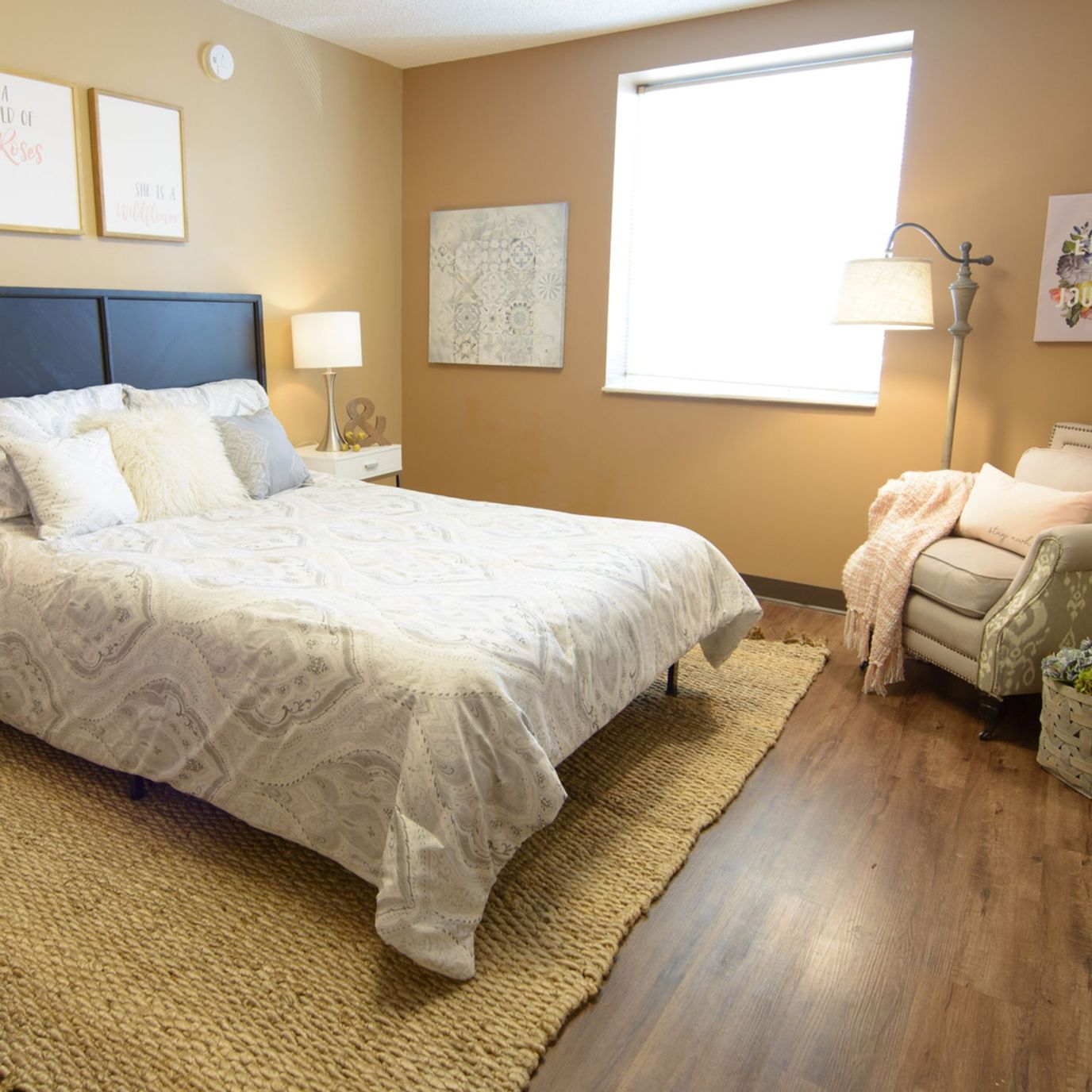 Brightly decorated private bedroom in a senior living facility