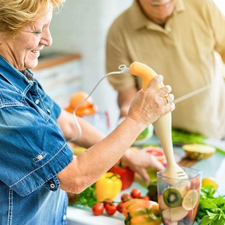 Mountainside of Warm Springs, assisted living in Warm Springs, GA — Seniors preparing healthy meals in a kitchen setting