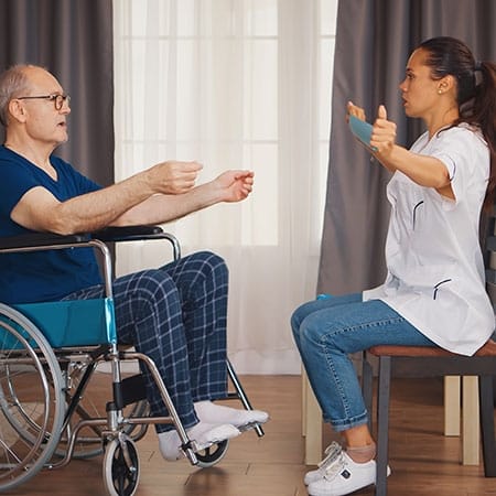 Mountainside of Warm Springs, assisted living in Warm Springs, GA — Therapist assisting a senior in a rehabilitation session