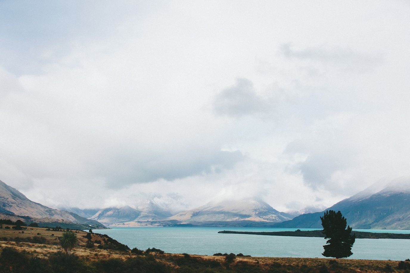 Scenic outdoor view of mountains and lake.