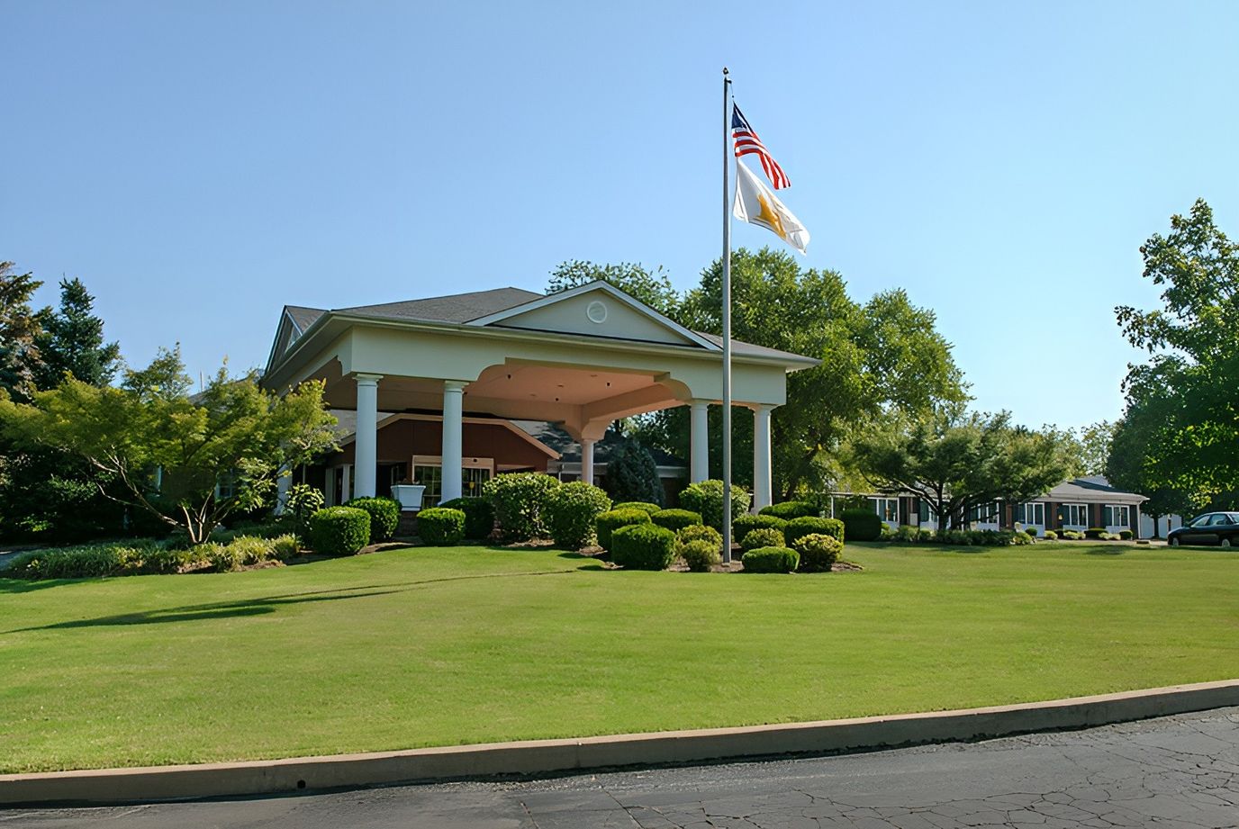 Exterior view of The Westchester House with landscaped grounds