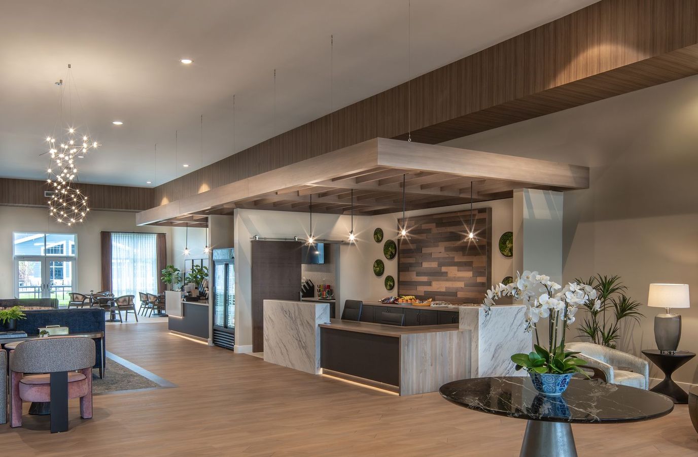 Modern interior of a community lounge area with reception