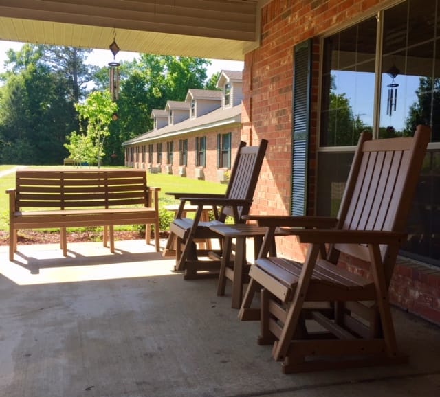 Outdoor seating area with rocking chairs