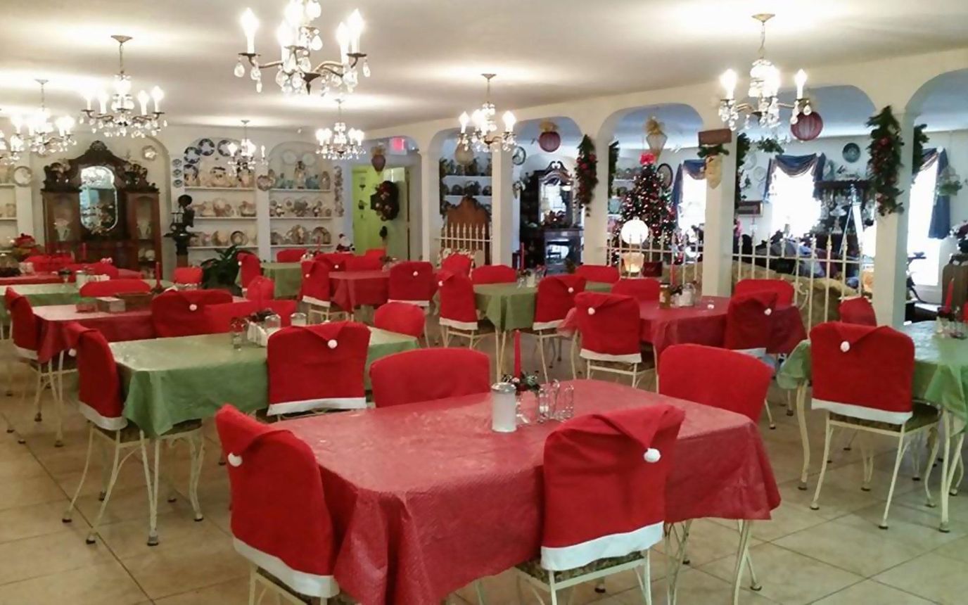Festively decorated dining room with red and green accents