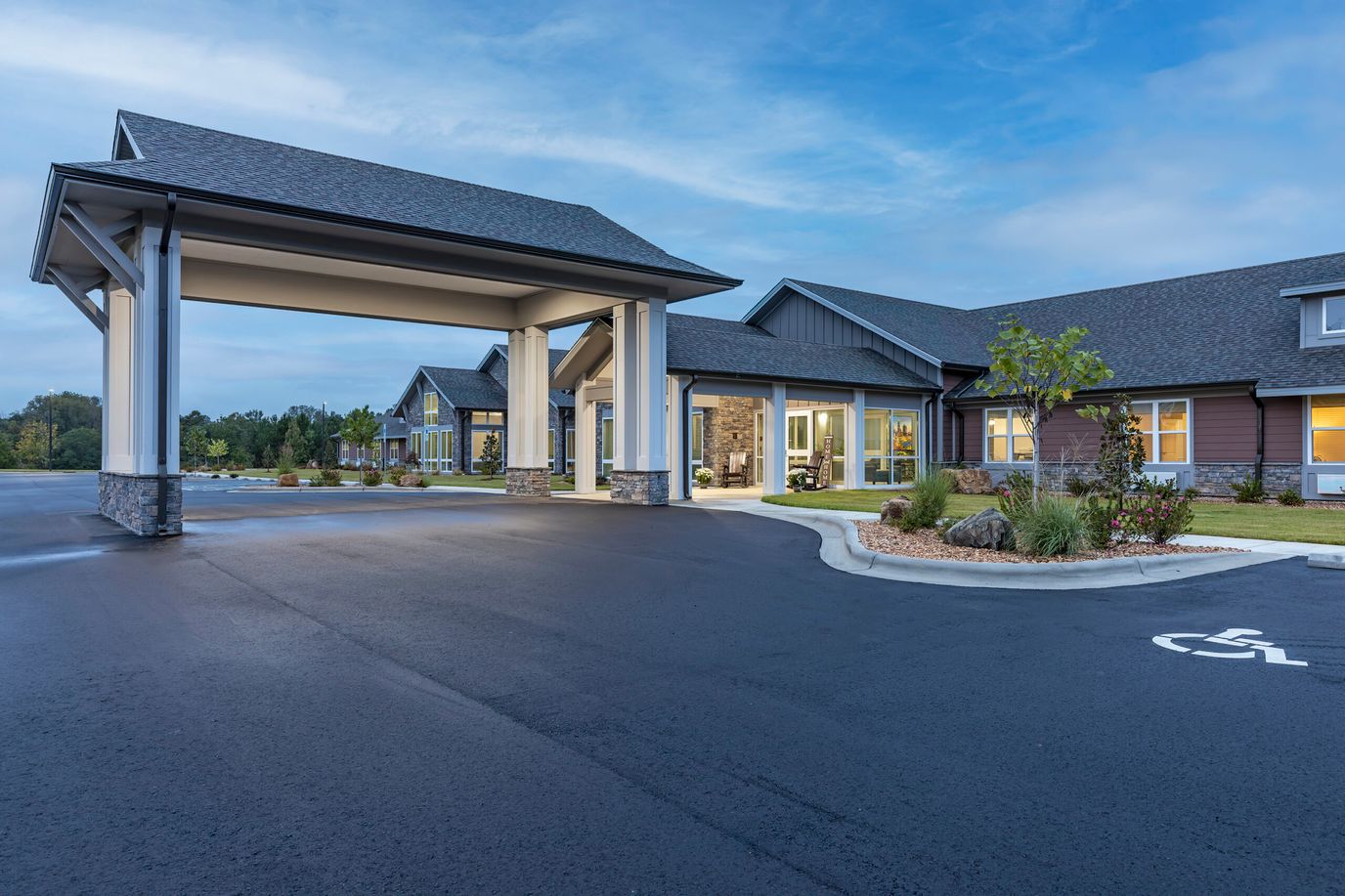 Front entrance of a senior living facility with covered entry