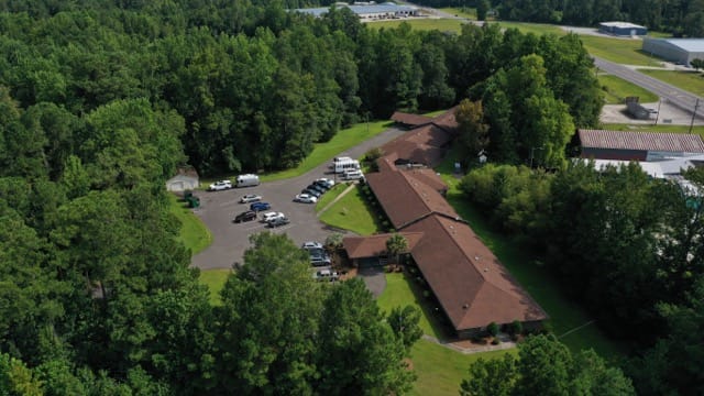 Aerial view of Tabor Commons surrounded by trees