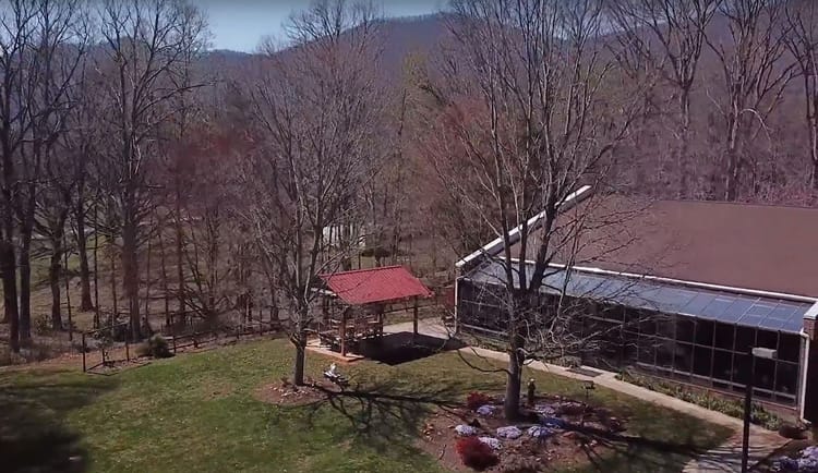 Aerial view of the facility's outdoor space and building
