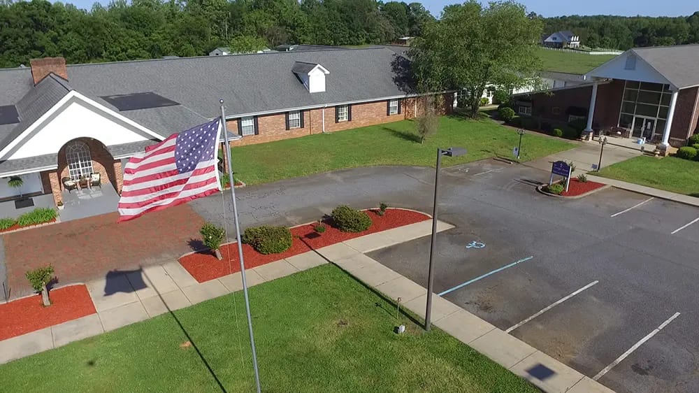 Aerial view of the Caremoor Retirement Center building entrance