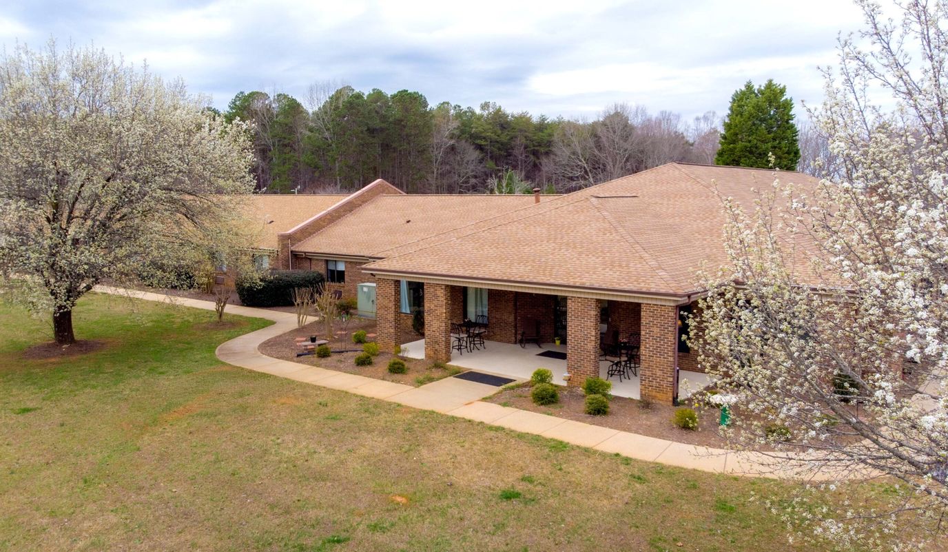 Aerial view of Country Time Inn with landscaping