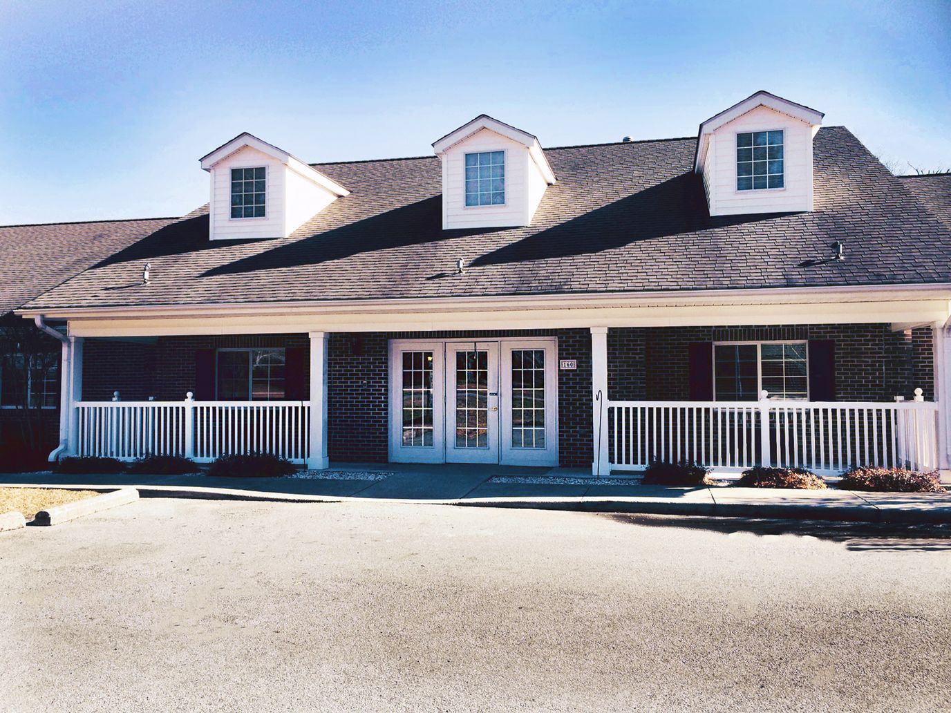 Exterior view of the facility building with a welcoming entrance