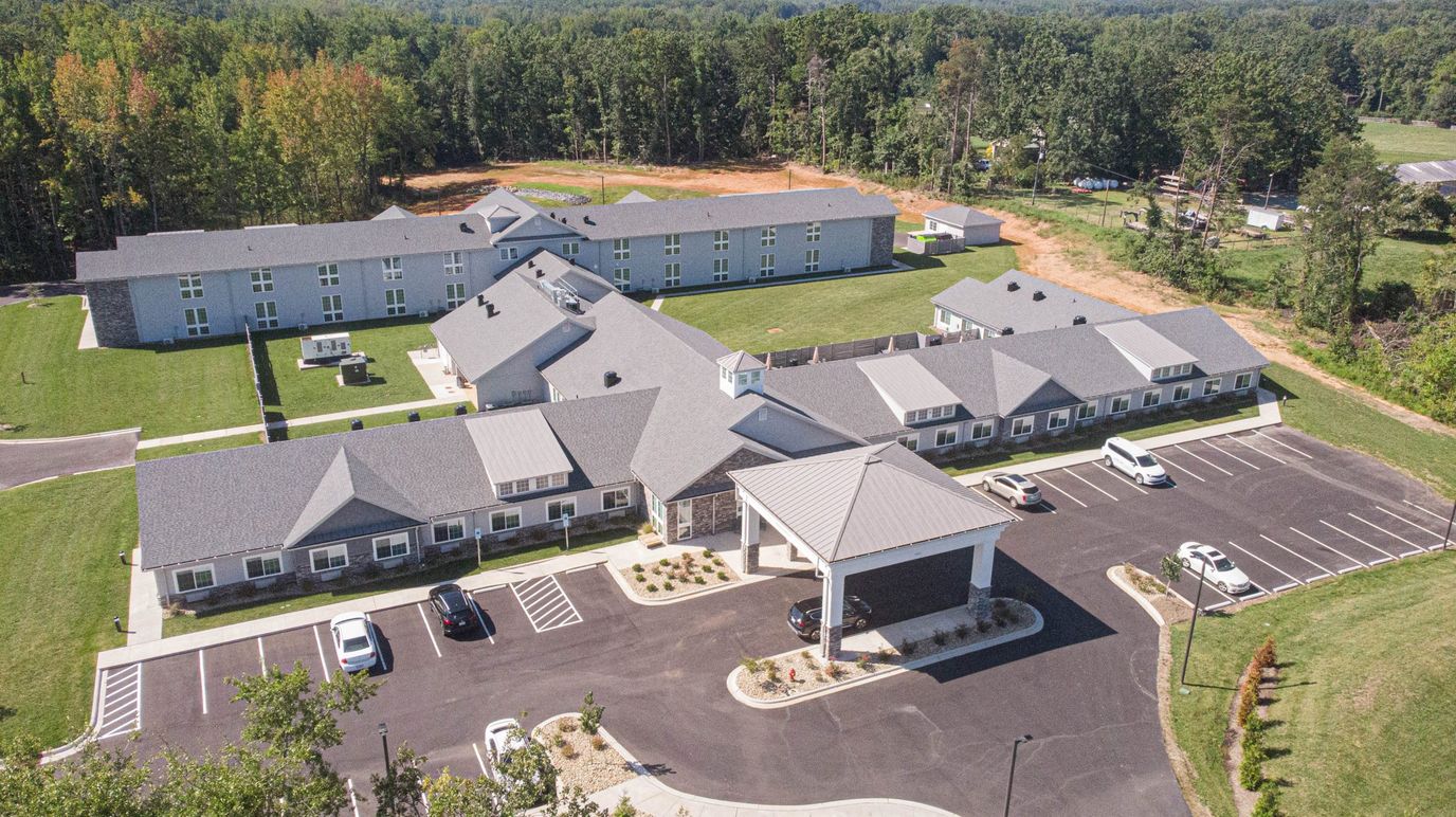 Aerial view of the facility with landscaped grounds