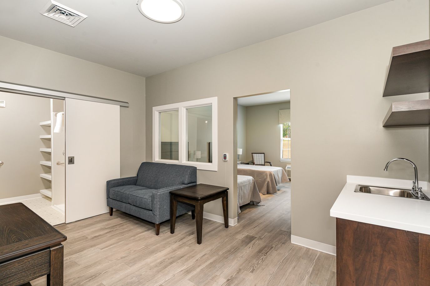 Interior room with seating and kitchenette