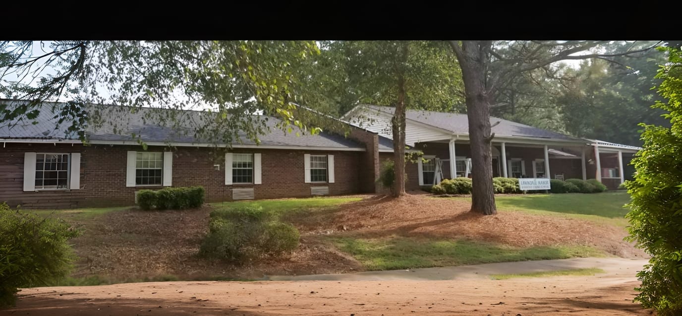 Exterior view of Lawndale Manor with landscaped grounds