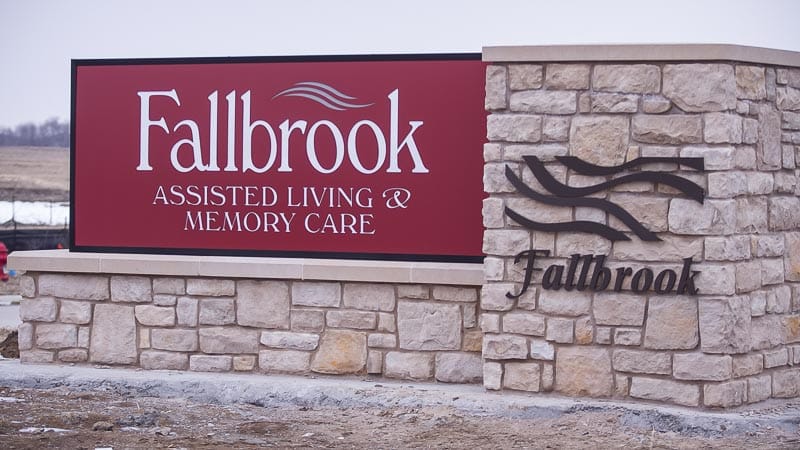 Facility sign displaying name and services