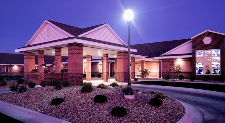 Exterior view of Linden Court facility at twilight