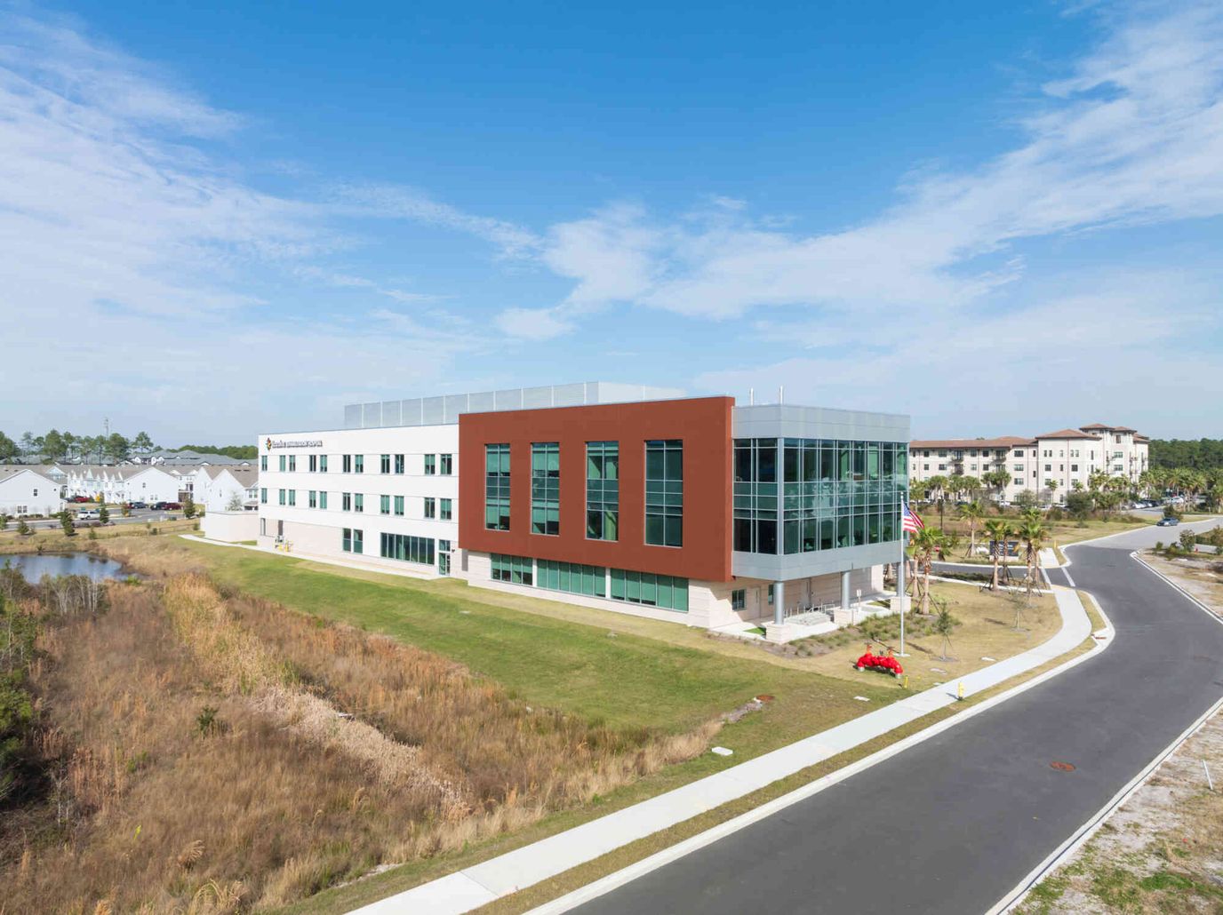 Exterior view of the facility with landscaping