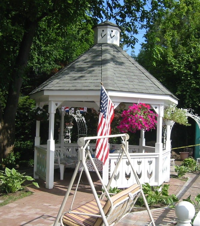 Gazebo with flowers and an American flag