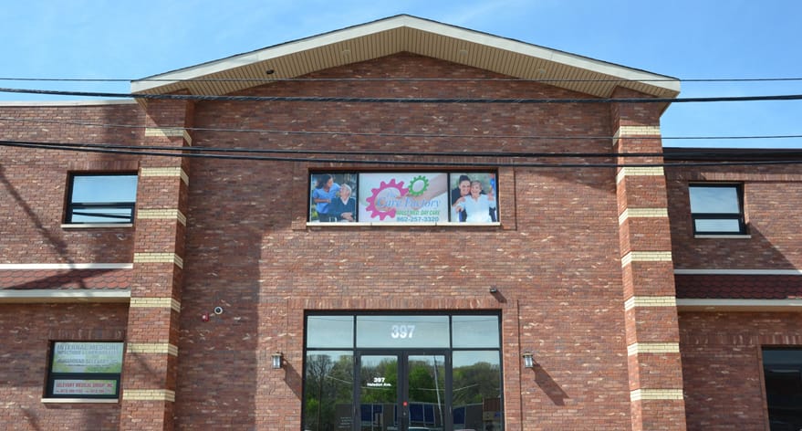 Exterior view of The Care Factory Inc with signage