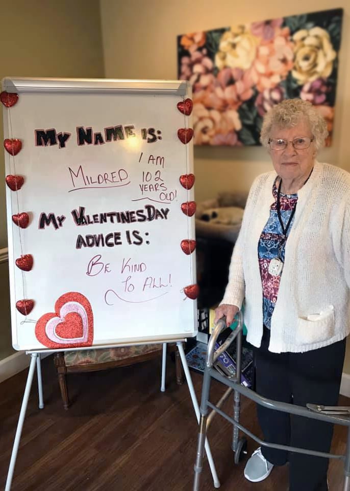 Resident sharing Valentine's Day advice in common area