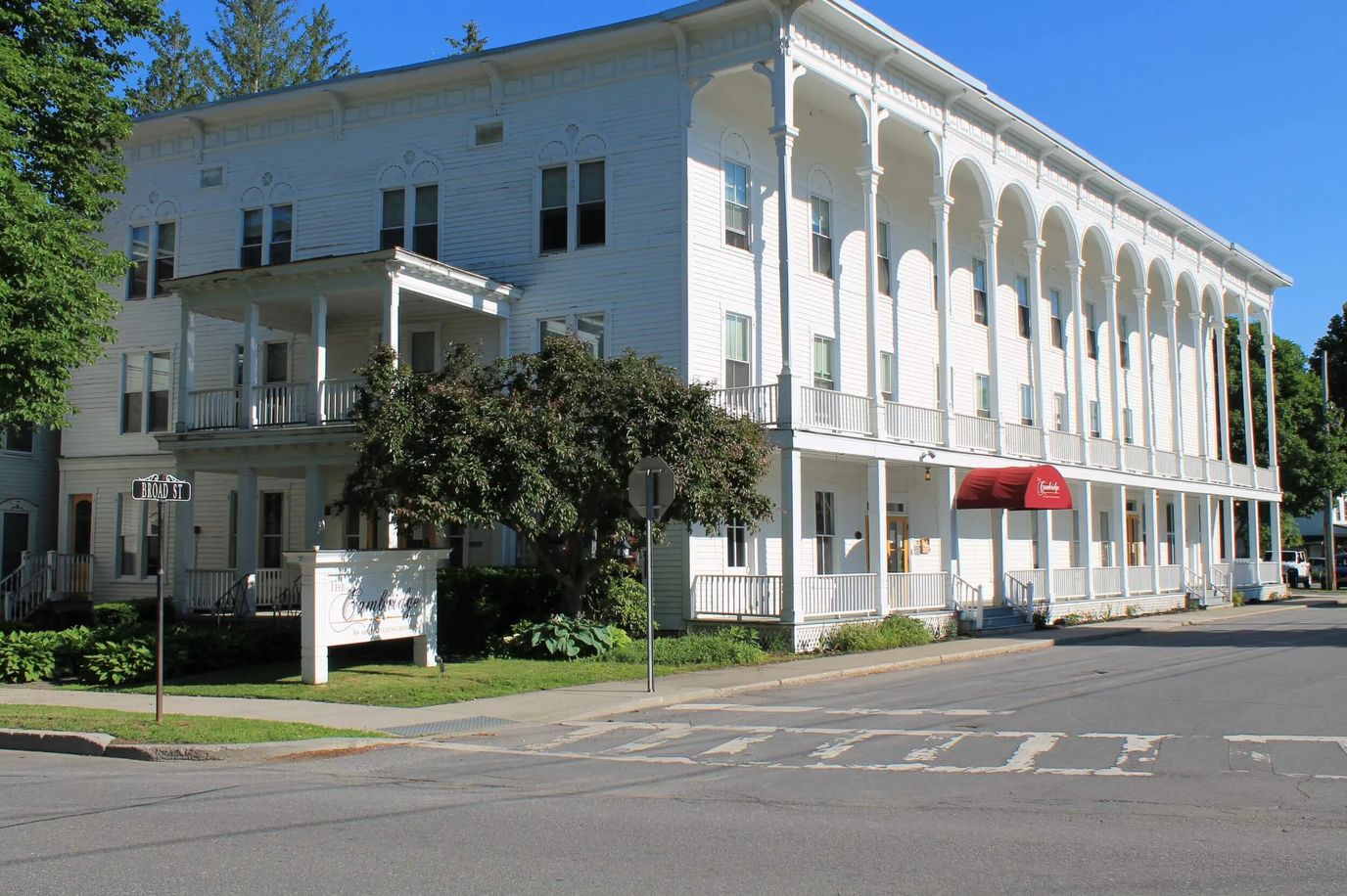 Exterior view of The Cambridge facility with entrance awning