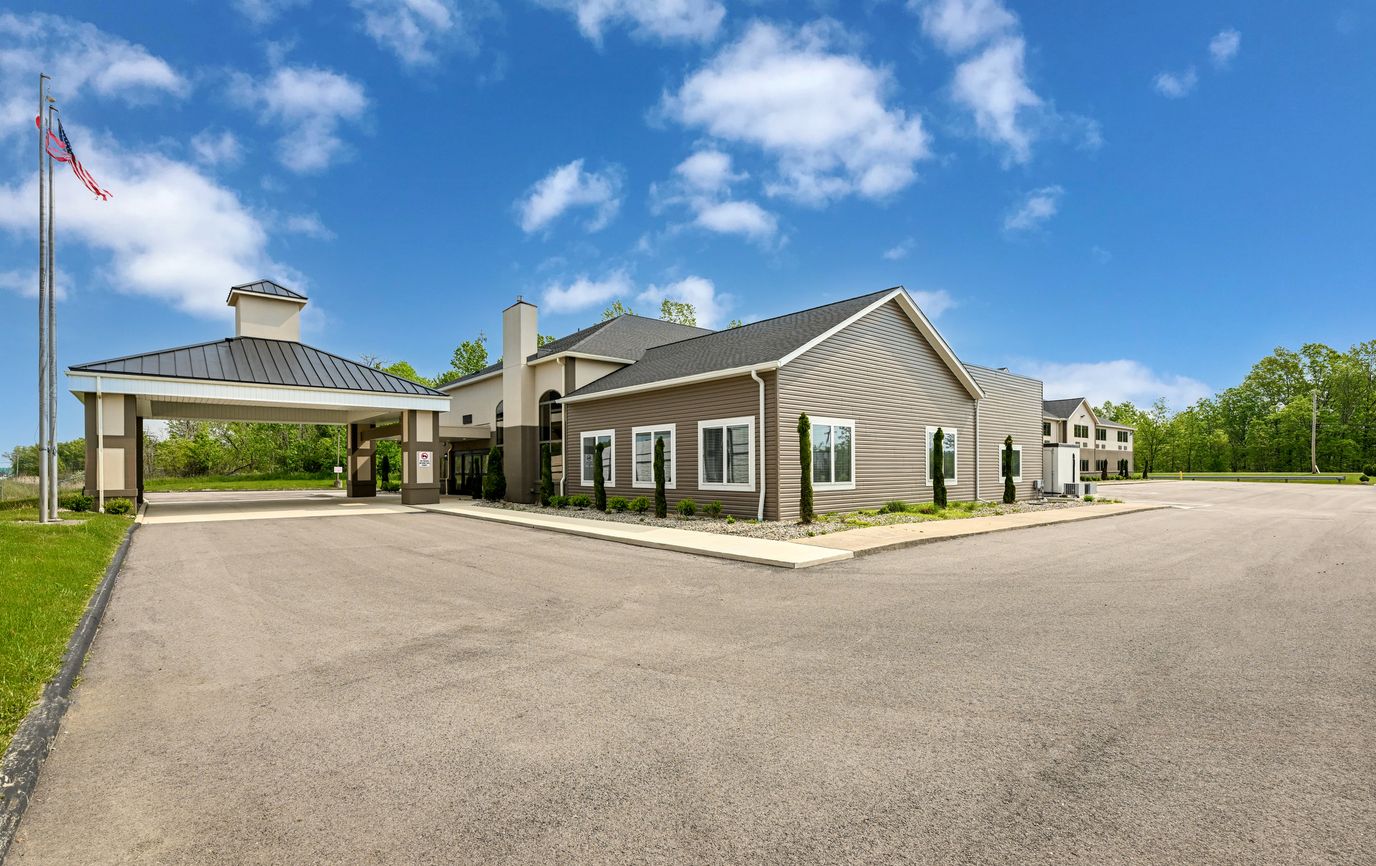 Modern assisted living facility exterior on a sunny day