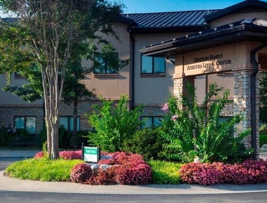 Exterior view of the assisted living center with landscaping