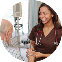 Reedwood Post Acute, Nursing Home in Portland, OR — Nurse interacting with a resident in a care setting