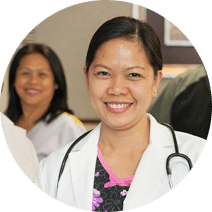 Reedwood Post Acute, Nursing Home in Portland, OR — Healthcare professional smiling in a clinical setting