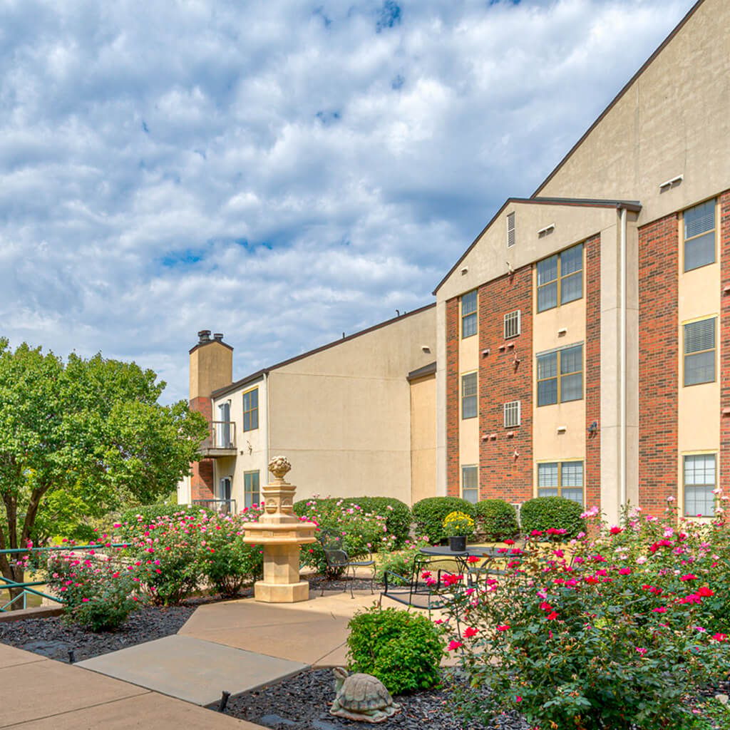 Exterior view of Green Country Village with landscaped gardens