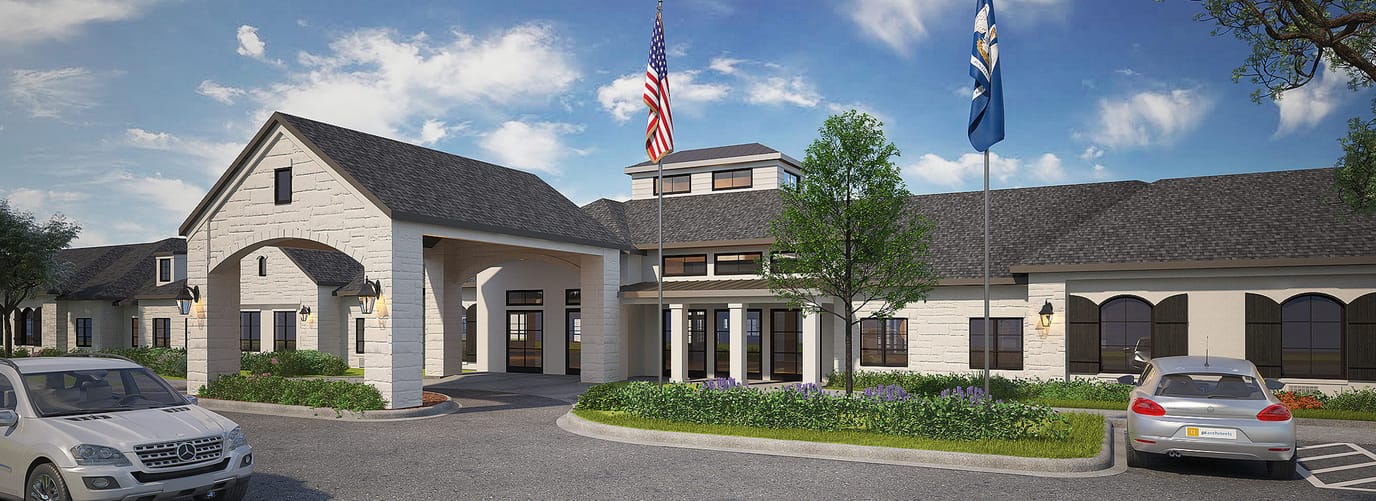 Exterior view of the assisted living facility with flags