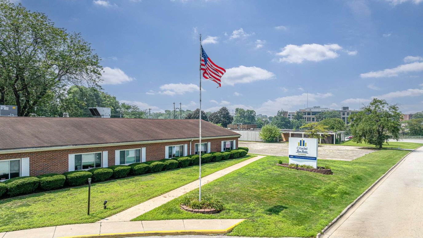 Building exterior of Citadel of Kankakee with flag