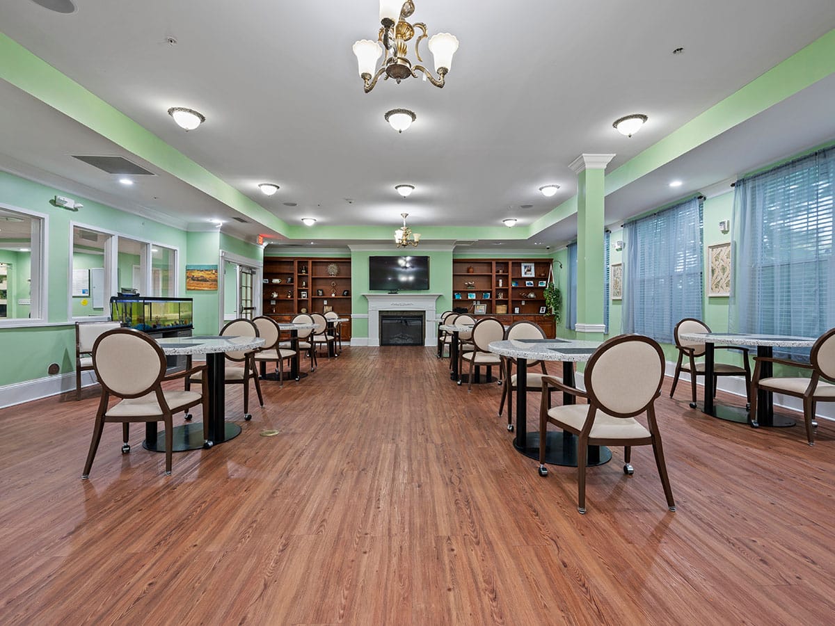 Bright dining area with tables and chairs