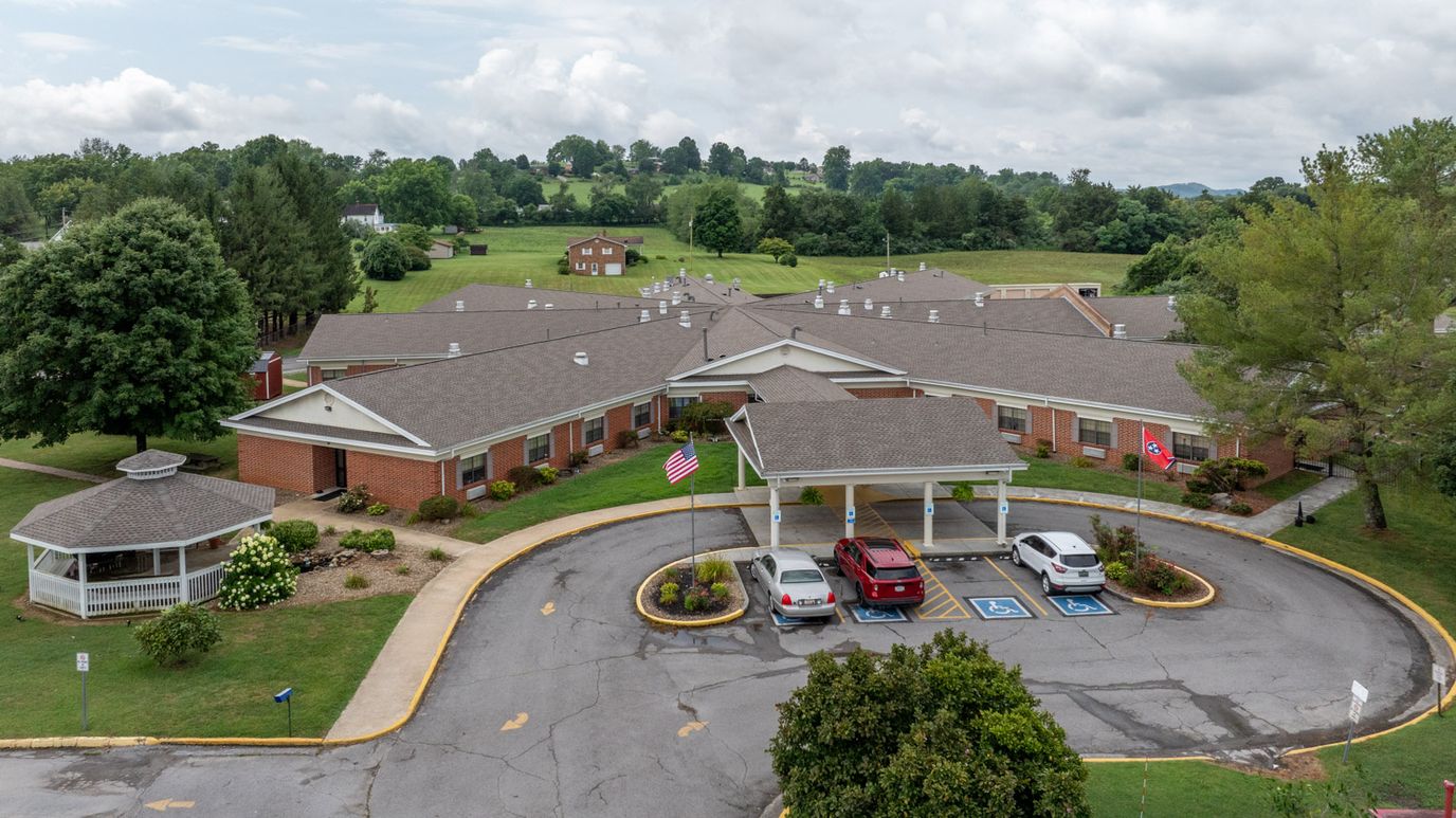 Aerial view of the facility's entrance and parking area