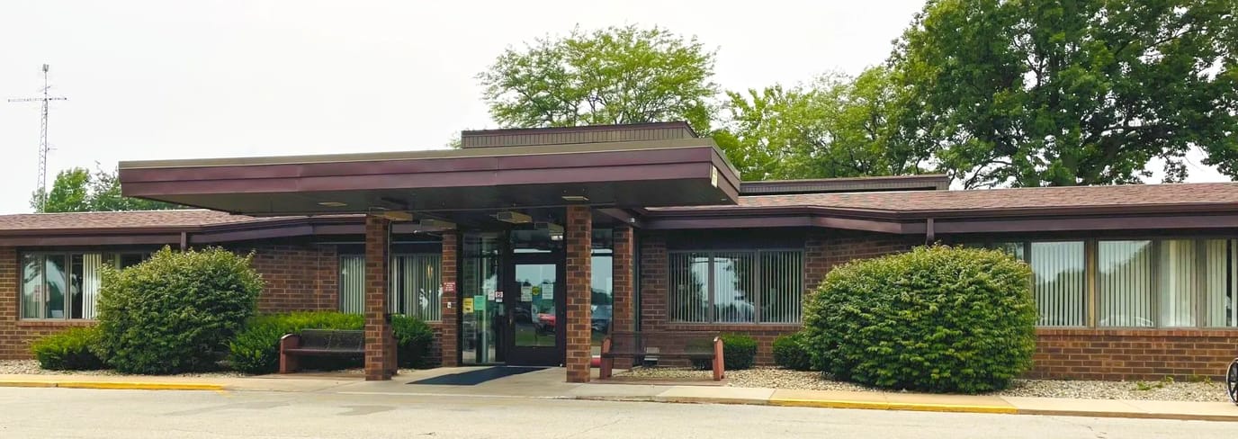 Exterior view of The Elms assisted living facility