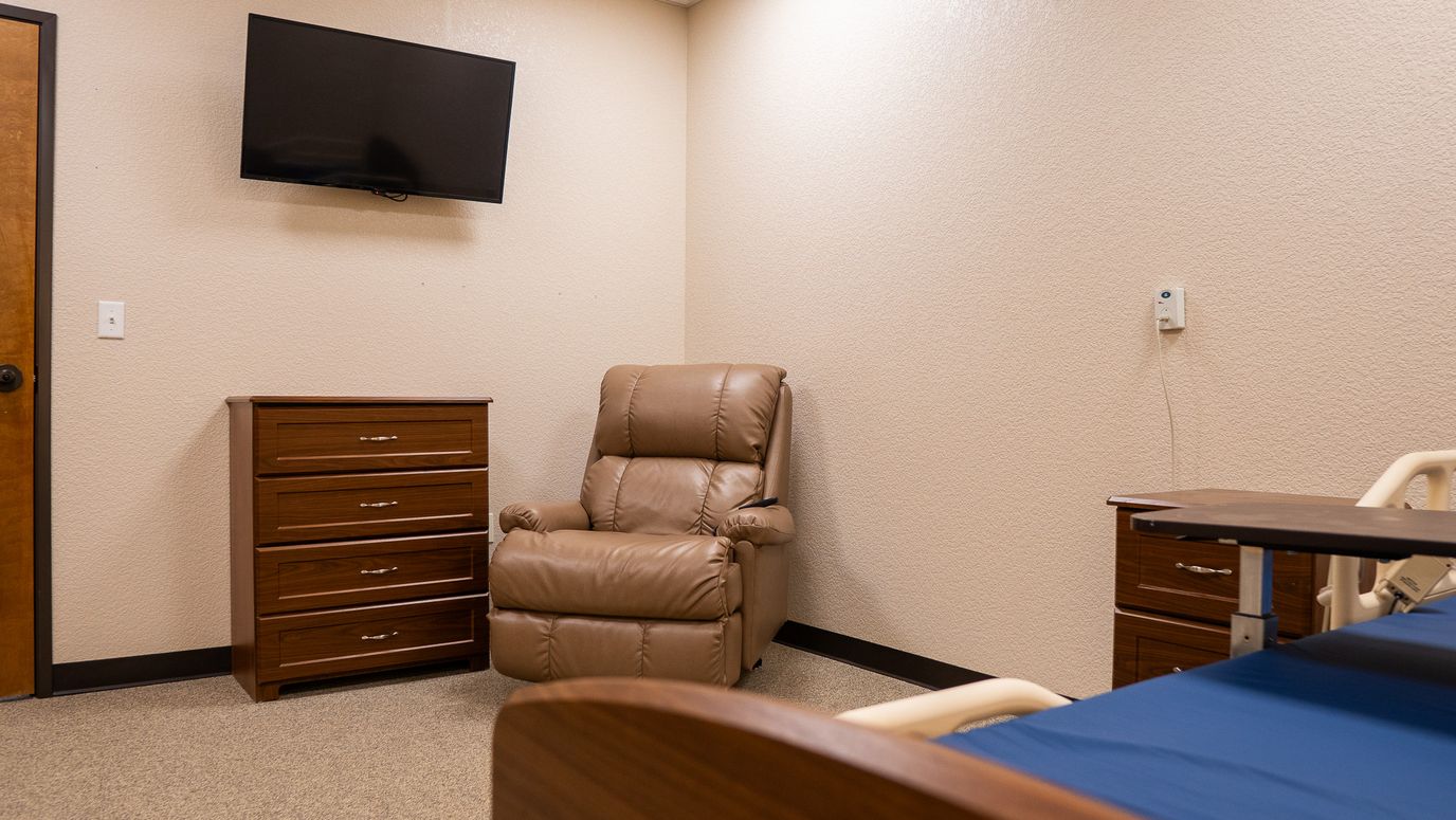 Interior view of a resident room with furniture