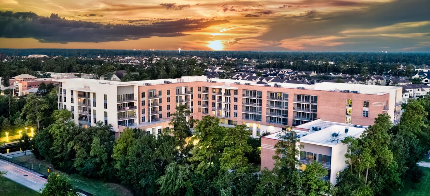 Aerial view of The Village at the Woodlands Waterway at sunset